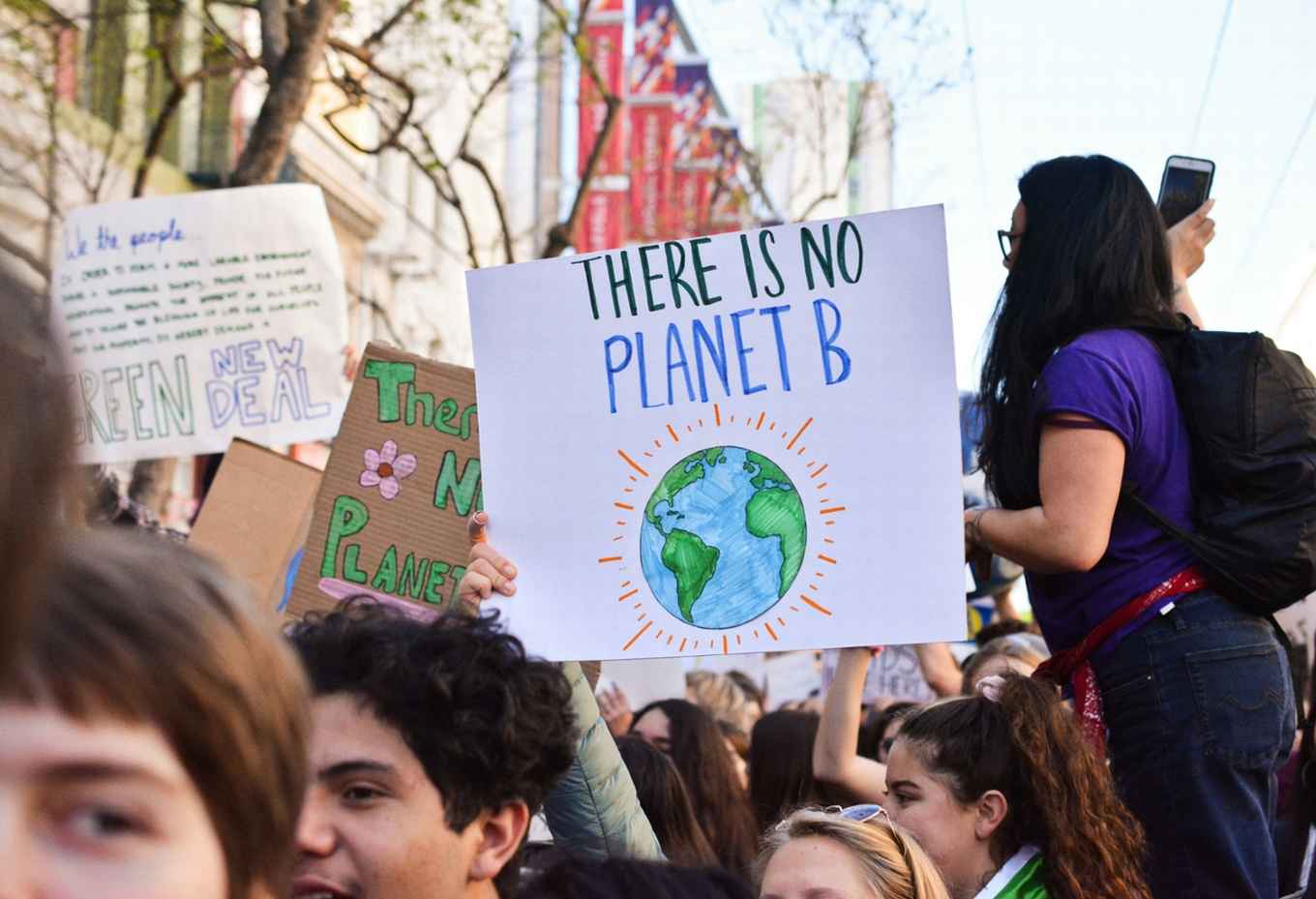 Climate activists who are participating in a protest.
